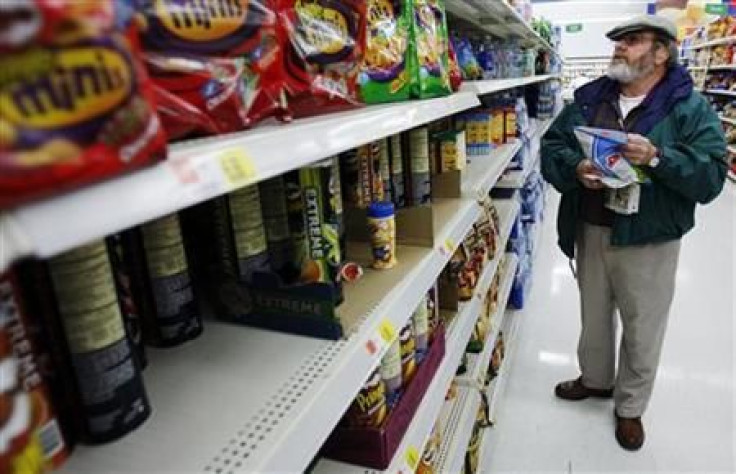 Michael Lipsitz picks out a bag of chips while grocery shopping at the WalMart in Crossville