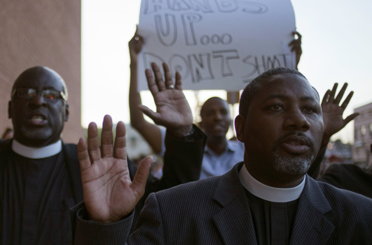 clergymen march to the County Prosecutor Bob McCulloch's office