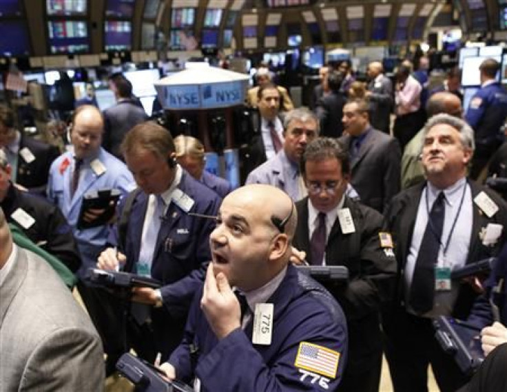 Traders work on the floor of the New York Stock Exchange