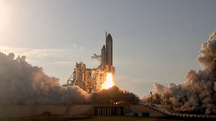 The space shuttle Discovery launching into space for the final time.