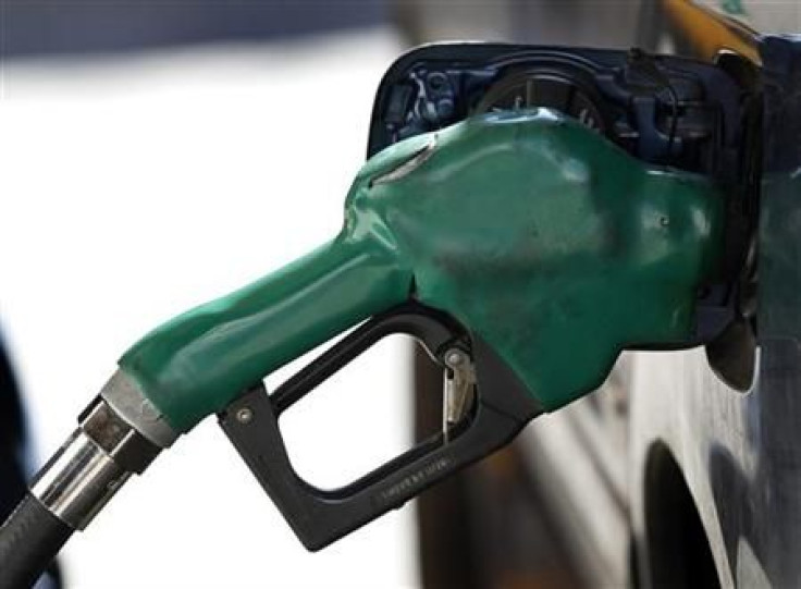 A gas nozzle is used to pump petrol at a station in New York