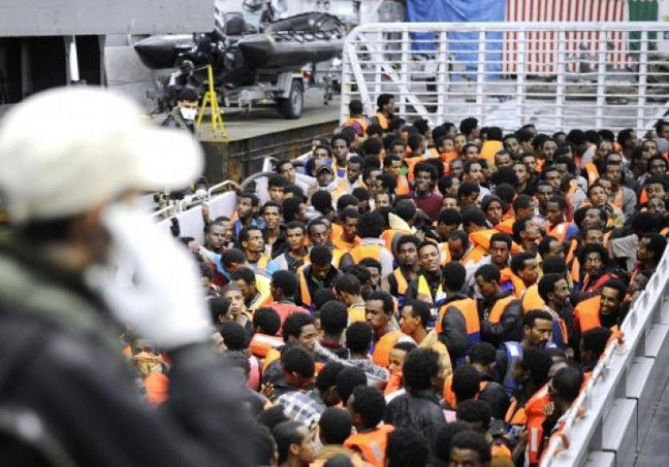 italy-african-migrants-on-rescue-boat-in-may-reuters-715x500
