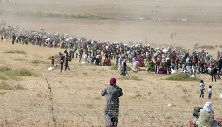 kurds fleeing isis