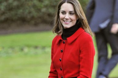 Kate Middleton returns in &quot;Red Regal&quot; style at St. Andrews.