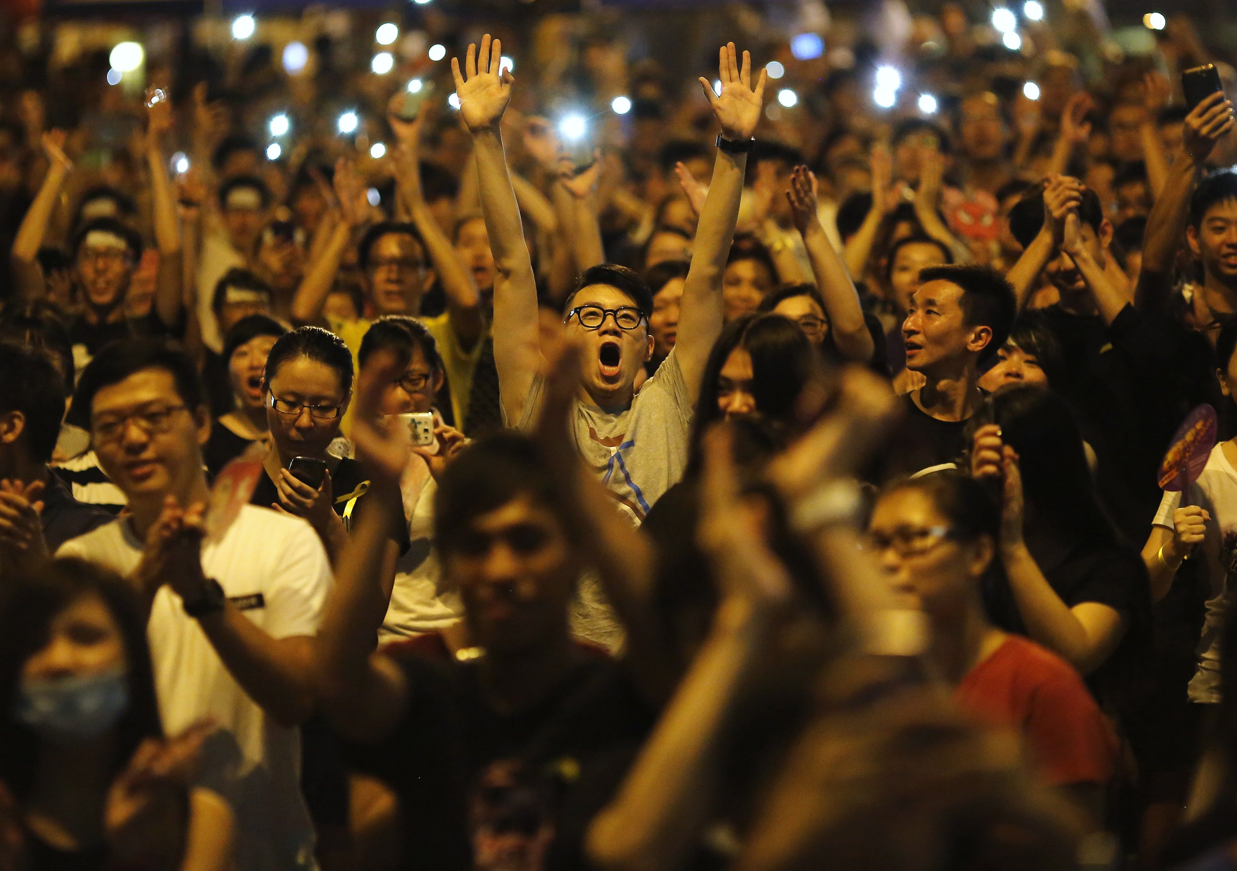 Occupy central. Протесты в Гонконге. Протестер.