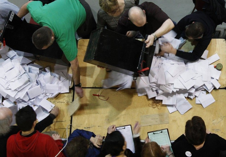 Ballot boxes are emptied during an election count in Dublin