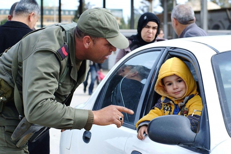Citizens of Tunisia returning from Libya arrive at Ras el-Jedir Ben Guerdane, 35 km southeast of Tunis