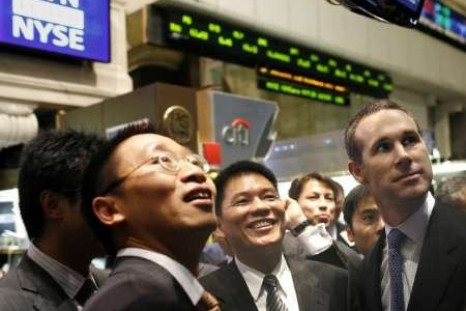 HK, China shares up as investors eye earnings, banks lead