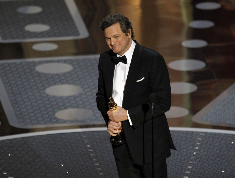 Colin Firth accepts the Oscar for best actor for his role in The Kings Speech during the 83rd Academy Awards in Hollywood