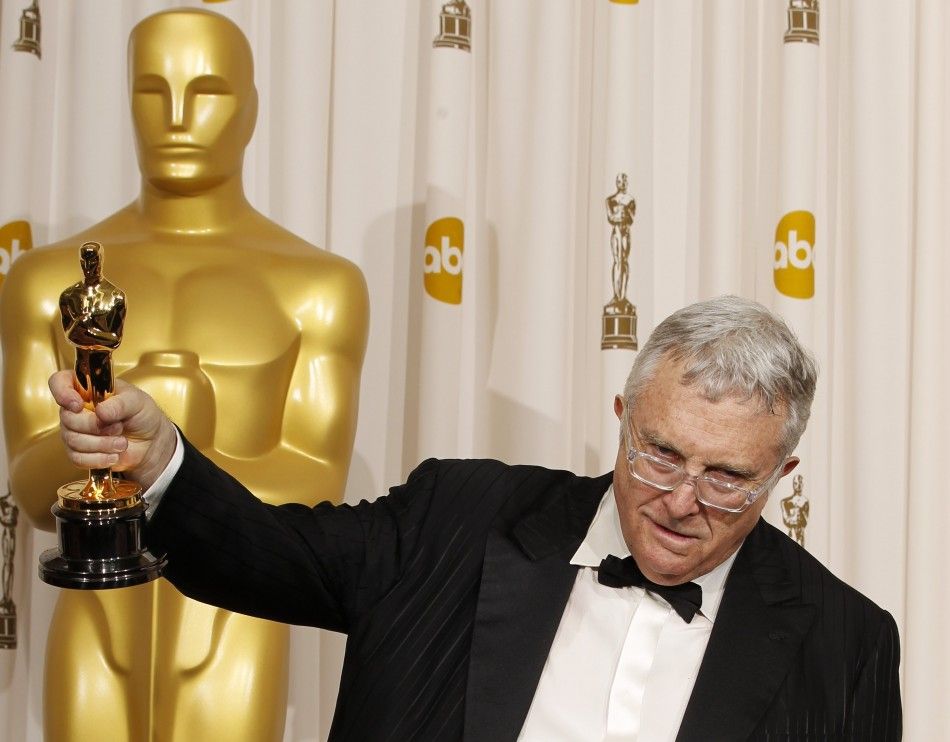 Randy Newman holds his award for best original song for We Belong Together from Toy Story 3, backstage at the 83rd Academy Awards in Hollywood, California, February 27, 2011. 
