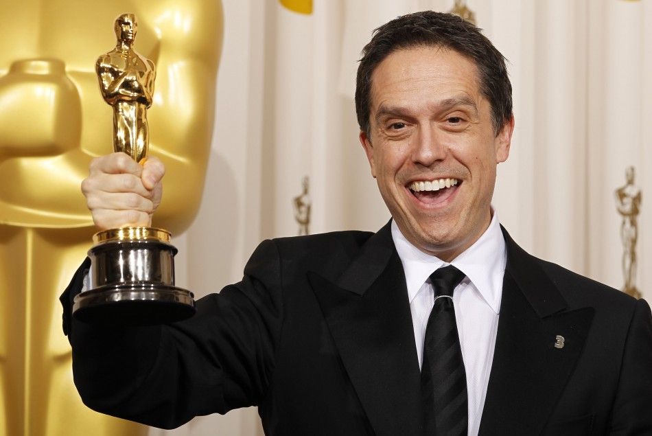 Lee Unkrich holds his Oscar for Best Animated Feature for Toy Story 3 backstage at the 83rd Academy Awards in Hollywood, California.