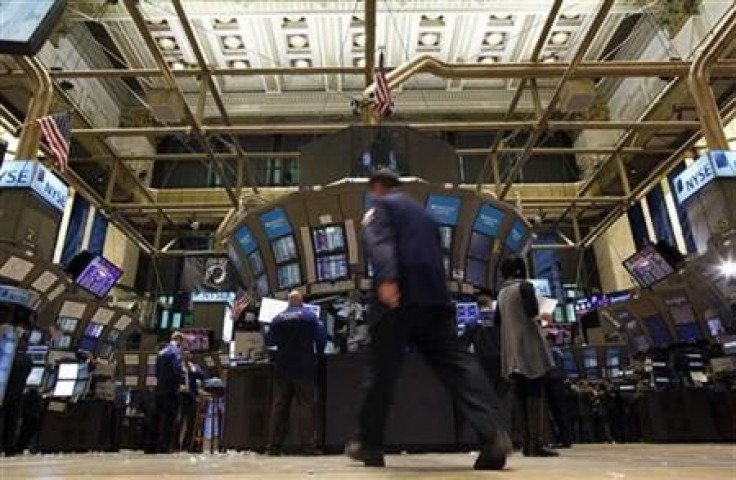 Traders work on the floor of the New York Stock Exchange