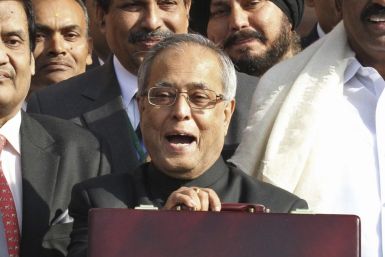India's Finance Minister Pranab Mukherjee speaks as he leaves his office to present the 2011/12 federal budget in New Delhi February 28, 2011.