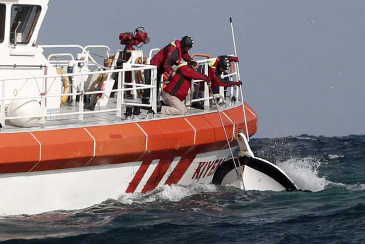 Rescuers retrieve a boat near Istanbul