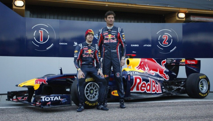 Red Bull Formula One drivers Mark Webber and Sebastian Vettel unveil the RB7 during the presentation of the 2011 Red Bull team in Valencia.