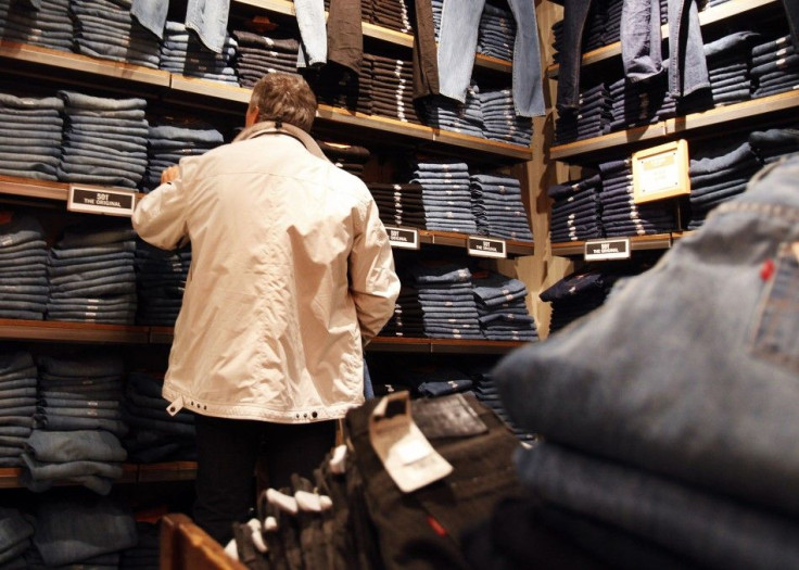 A man shops for blue jeans at a clothing store in New York