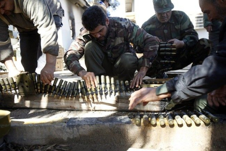 Anti-government rebels dry ammunition in a base for training and recruiting rebels for the army in Benghazi February 28, 2011.