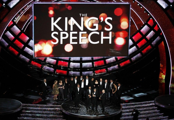 Producers Emile Sherman (C), Iain Canning (2nd R) and Gareth Unwin (R) stand with director Tom Hopper (L) and cast after "The King's Speech" won best picture during the 83rd Academy Awards in Hollywood, February 27, 2011