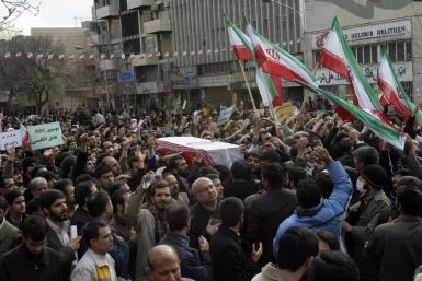 People take part in the funeral of Sanee Zhaleh, a student who was shot dead during an opposition rally on Monday, in Tehran February 16, 2011