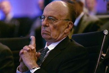 News Corporation Chairman and CEO Rupert Murdoch listens to morning discussion session during the Wall Street Journal CEO Council on &quot;Rebuilding Global Prosperity&quot; in Washington