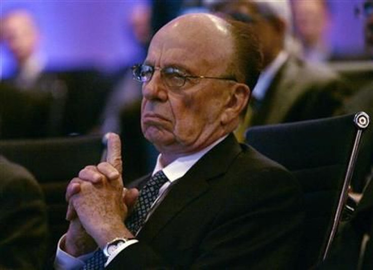 News Corporation Chairman and CEO Rupert Murdoch listens to morning discussion session during the Wall Street Journal CEO Council on &quot;Rebuilding Global Prosperity&quot; in Washington
