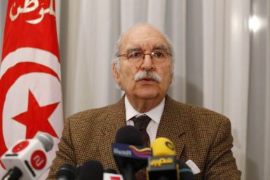 Interim Tunisian President Fouad Mebazza speaks during a news conference in Tunis