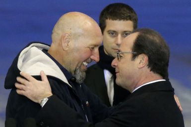 Serge Lazarevic and French President Francois Hollande