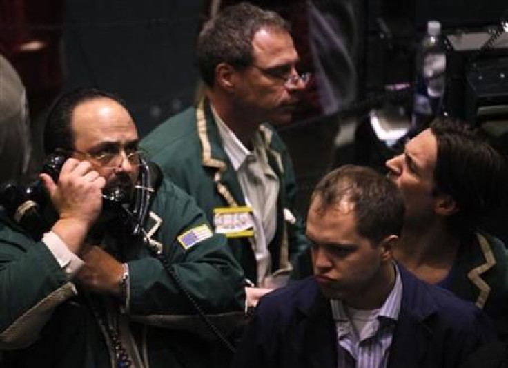 Traders work in the oil options pit on the floor of the New York Mercantile Exchange in New York