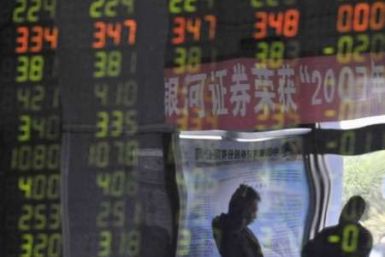 Shanghai, HK shares down on oil, Mideast but volume thin