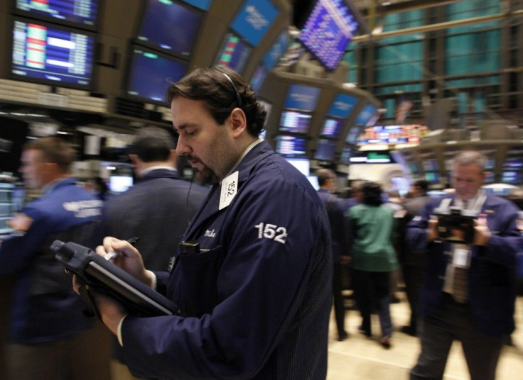 Traders work on the floor of the New York Stock Exchange