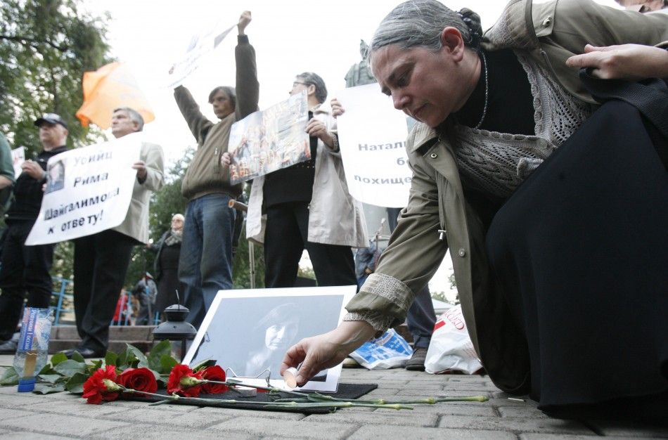 Russian rights group Memorial and its founder Svetlana Gannushkina Photo A woman places a candle near a portrait of slain Russian human rights activist Natalya Estemirova in Moscow, August 24, 2009. Estemirova, a human rights activist for the group Memo