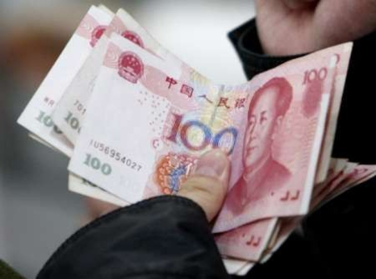 Fitch downgrades China's local currency debt rating outlook