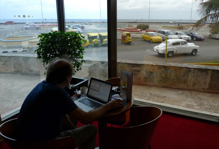 Man uses Internet in hotel in Hanava, Cuba 