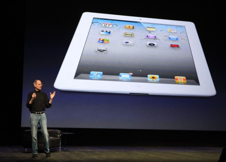 Apple Inc. CEO Steve Jobs introduces the iPad 2 on stage during an Apple event in San Francisco, California March 2, 2011