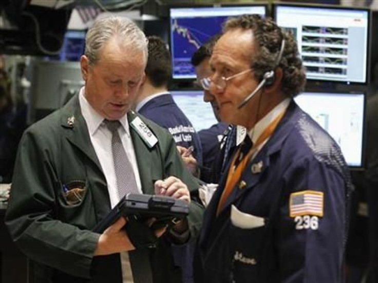 Traders work on the floor of the New York Stock Exchange