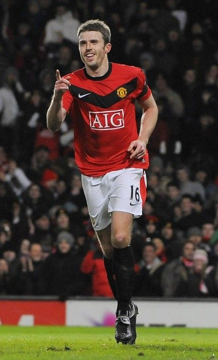 Michael Carrick is sticking around Old Trafford