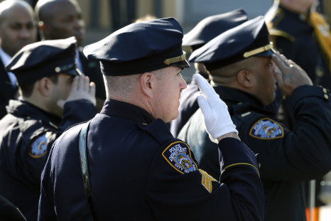 NYPD officers salute