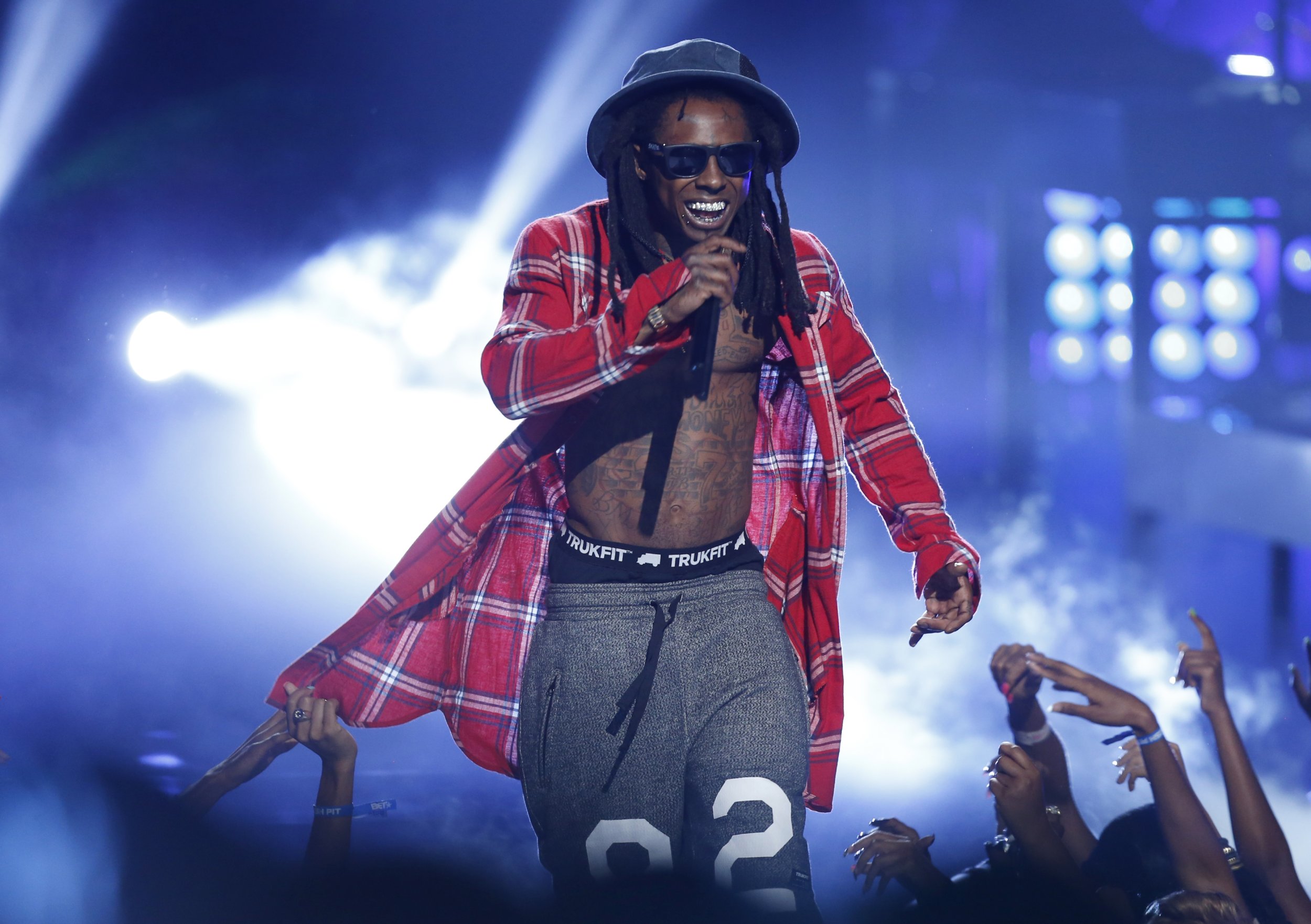 Рэперы хиты. Lil Wayne 2023. Lil Wayne 2014. Lil Wayne 2000. Lil Wayne с звездами.