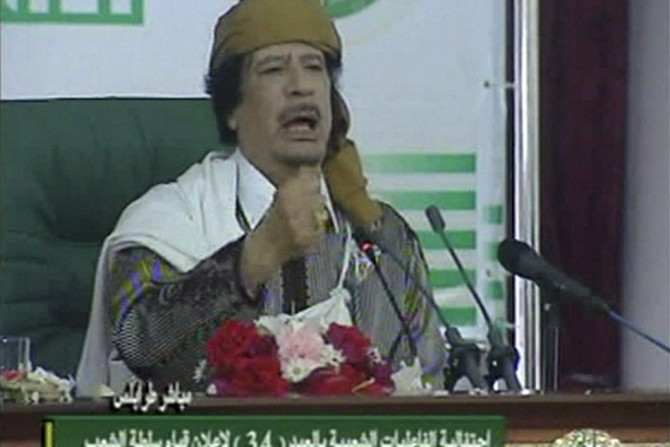 Image from video shows Libyan leader Gaddafi speaking at an event in Tripoli