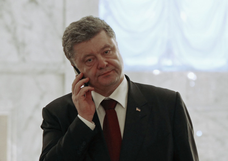 2015-02-12T092233Z_1368842638_GM1EB2C1C6G01_RTRMADP_3_UKRAINE-CRISIS-MINSK-POROSHENKO