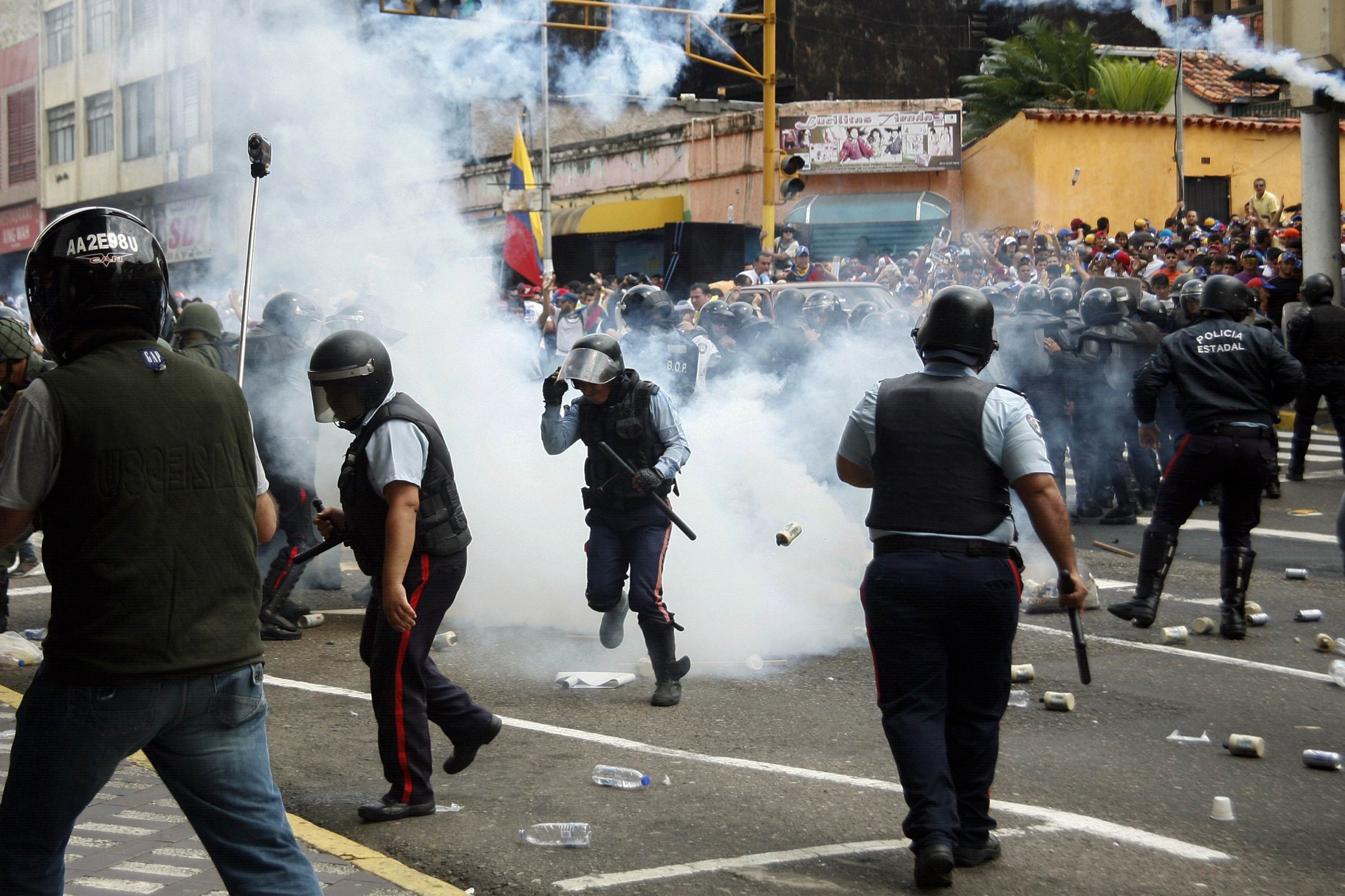 Venezuela Protesters Clash With Police On Anniversary Of Anti ...