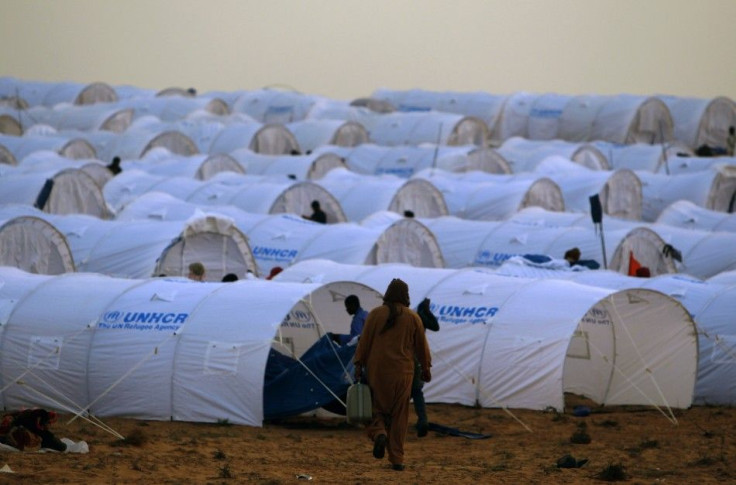 Evacuee arrives at a refugee camp in Tunisia