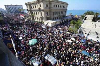 Egyptian pro-democracy supporters march in Alexandria