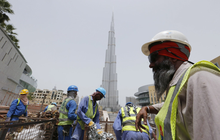 construction-workers-dubai-burj-khalifa-reuters-050714