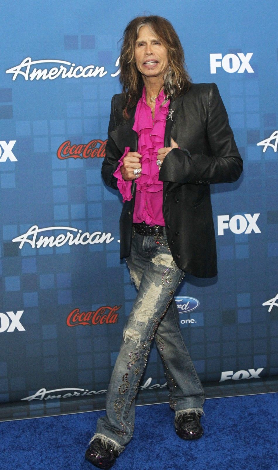 American Idol judge Steven Tyler poses at the party for the finalists of the television show quotAmerican Idolquot in Los Angeles March 3, 2011. 