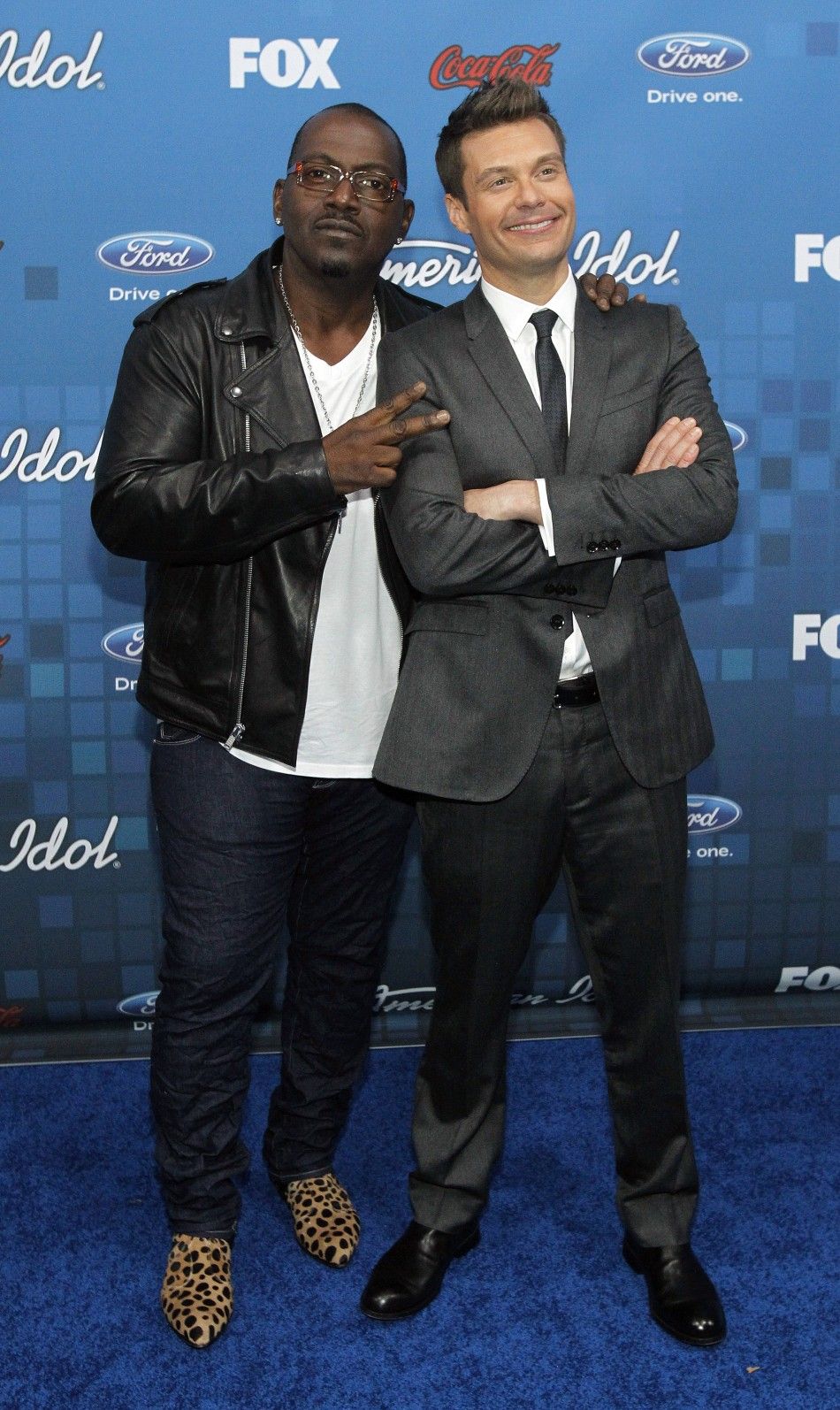 American Idol judge Randy Jackson L and show host Ryan Seacrest pose at the party for the finalists of the television show quotAmerican Idolquot in Los Angeles March 3, 2011.