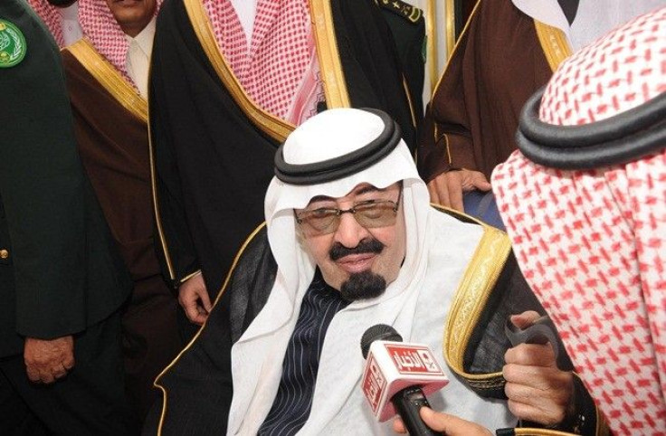 Saudi Arabia's King Abdullah speaks to Saudi media upon his arrival at Riyadh airport February 23, 2011.