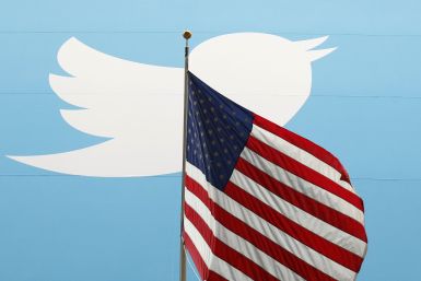 Twitter logo as background to American flag