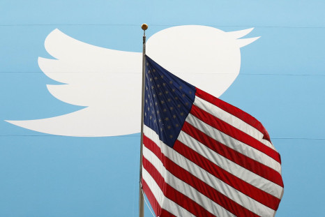 Twitter logo as background to American flag