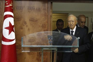 Tunisian interim prime minister Beji Caid Sebsi arrives to a news conference in Tunis